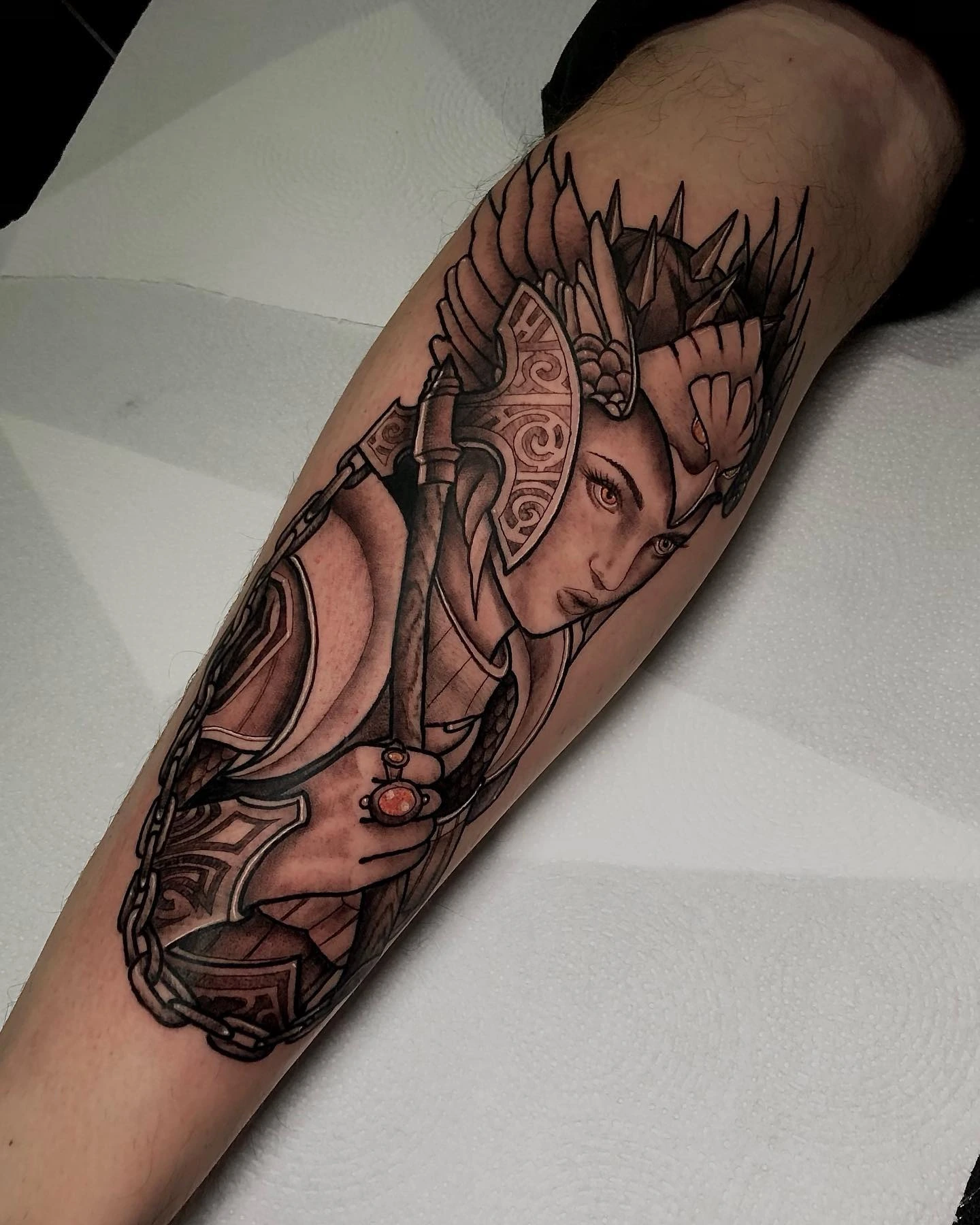 Valkyrie warrior with sword and shield, red gem accent