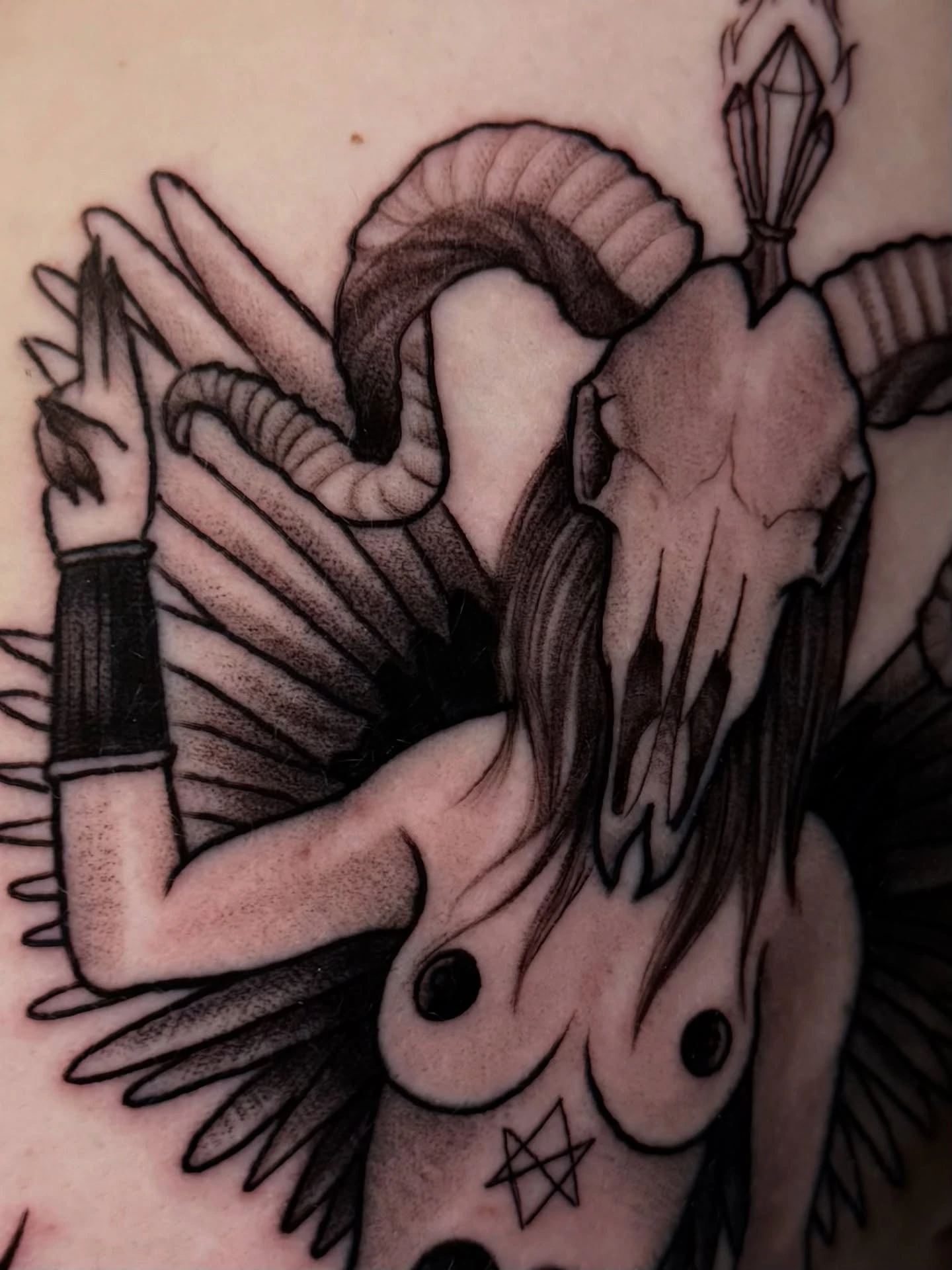Detail of Baphomet/horned demoness — close-up