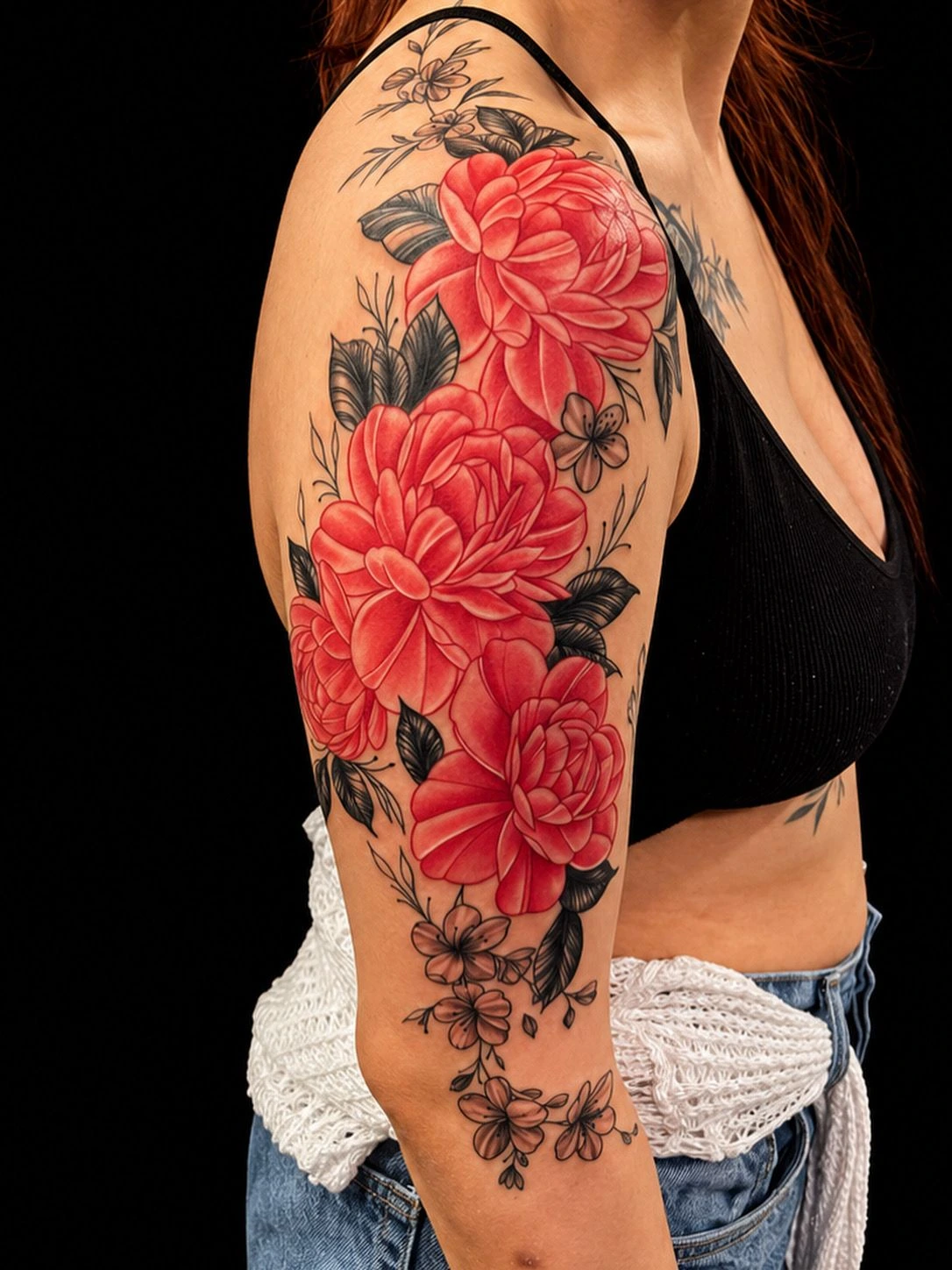 Red peony cluster with B&G leaves and trailing florals, half sleeve