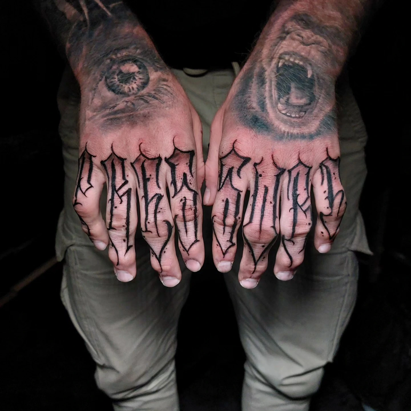 Ape/gorilla face hand portraits + 'IDEAS' Old English finger lettering