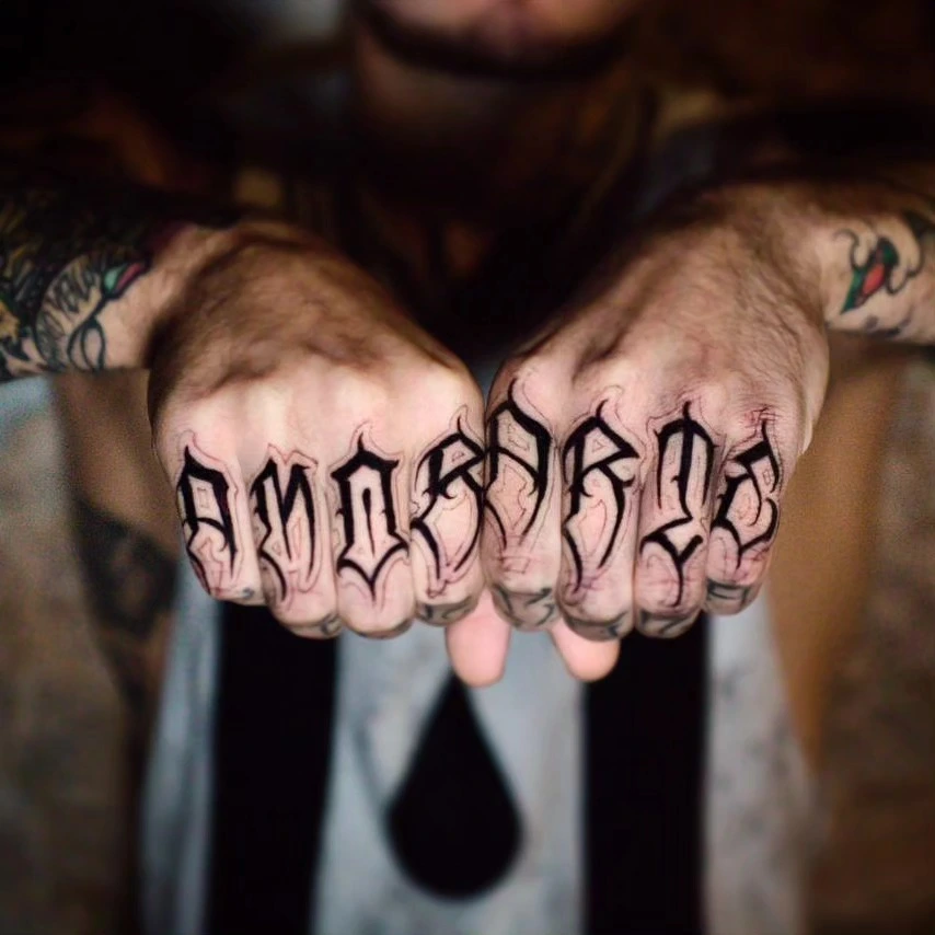 Hannya samurai mask on hand with tribal smoke fingers