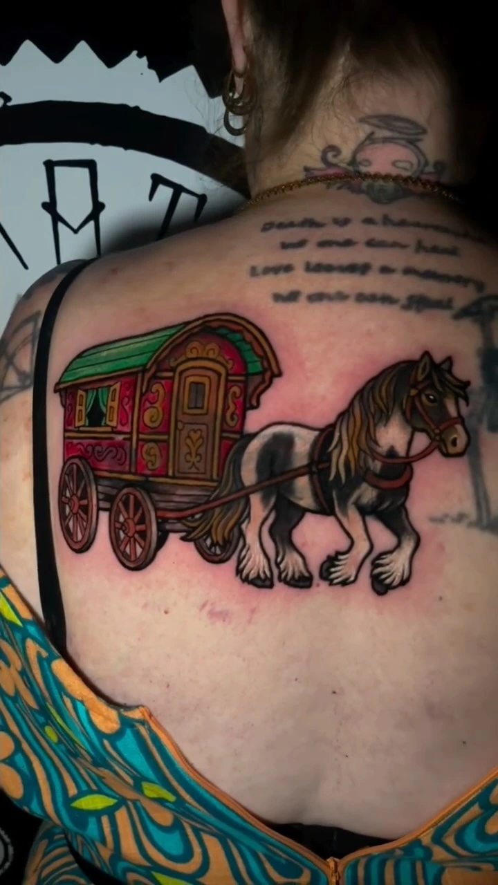 Romani / gypsy vardo wagon pulled by Clydesdale horse, traditional flash style