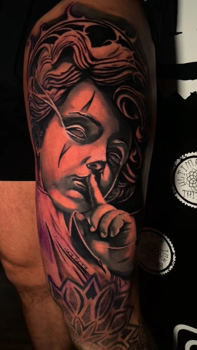 Female Chicano clown / payasa portrait shushing, with lotus mandala below