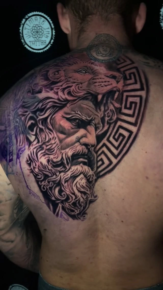 Zeus back portrait with cougar/lion head crown and Greek meander border