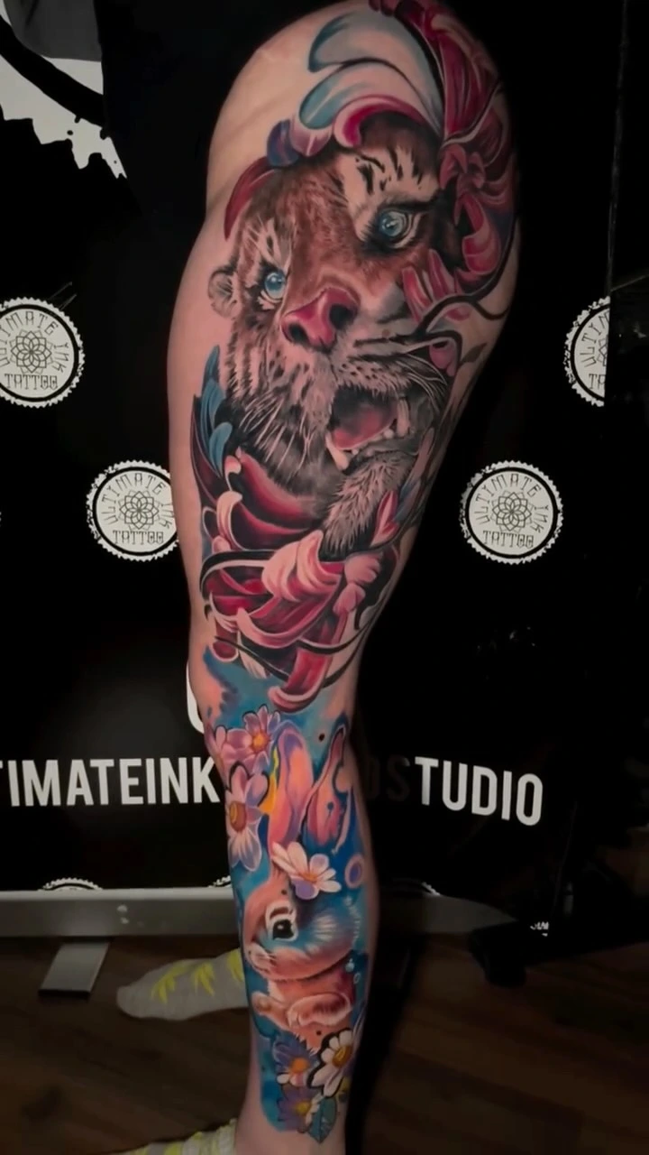 Color realism tigress face with peony cluster, full leg piece with secondary squirrel below