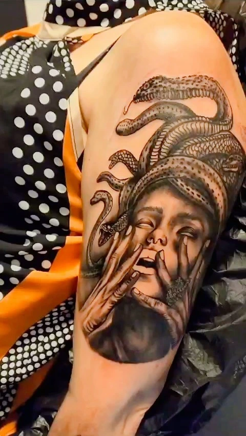 Medusa B&G with snakes thigh piece, hands covering face