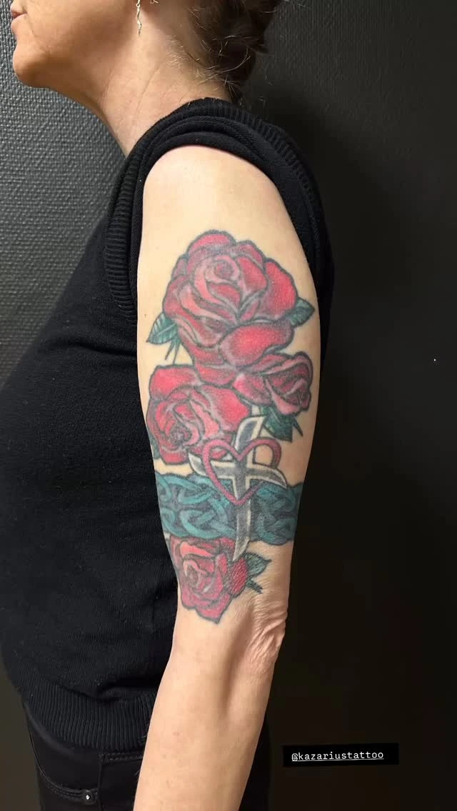 red roses + cross + heart with celtic-style band, upper arm
