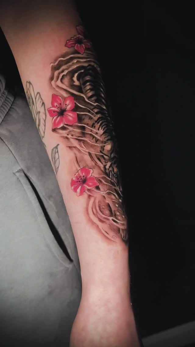 color realism with pink hibiscus flowers over gargoyle/creature wing