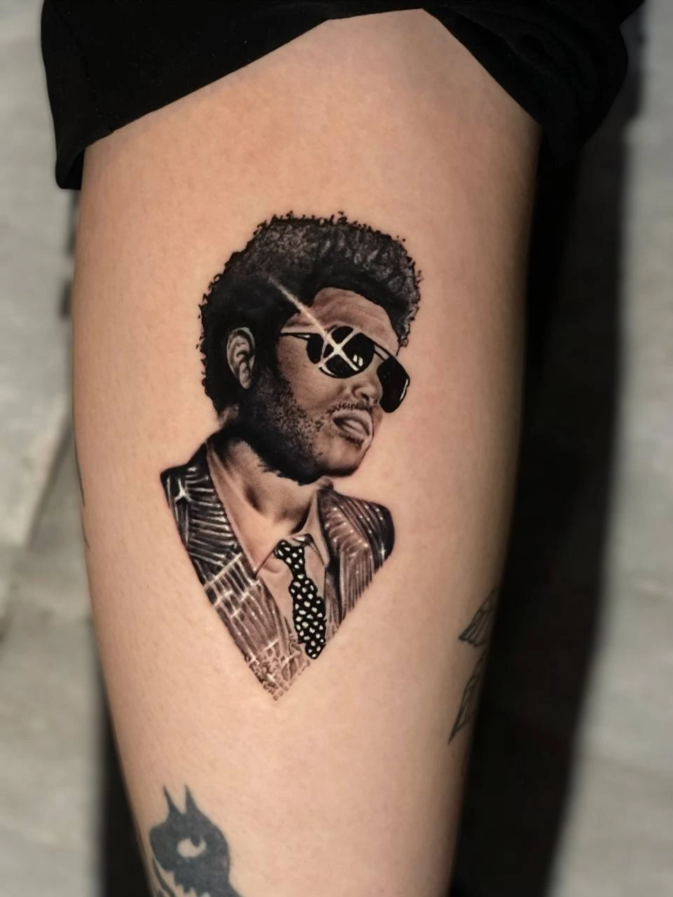 The Weeknd portrait with afro and aviator sunglasses